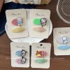 New Korean-style children's fabric cartoon hair clip with checkered oval bangs and side tousled hair, a girl's bye-bye hair clip accessory Application Scenario